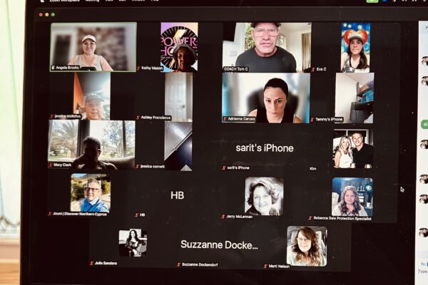 Screenshot of a Zoom call with multiple participants during a Power Hour coaching session for entrepreneurs.