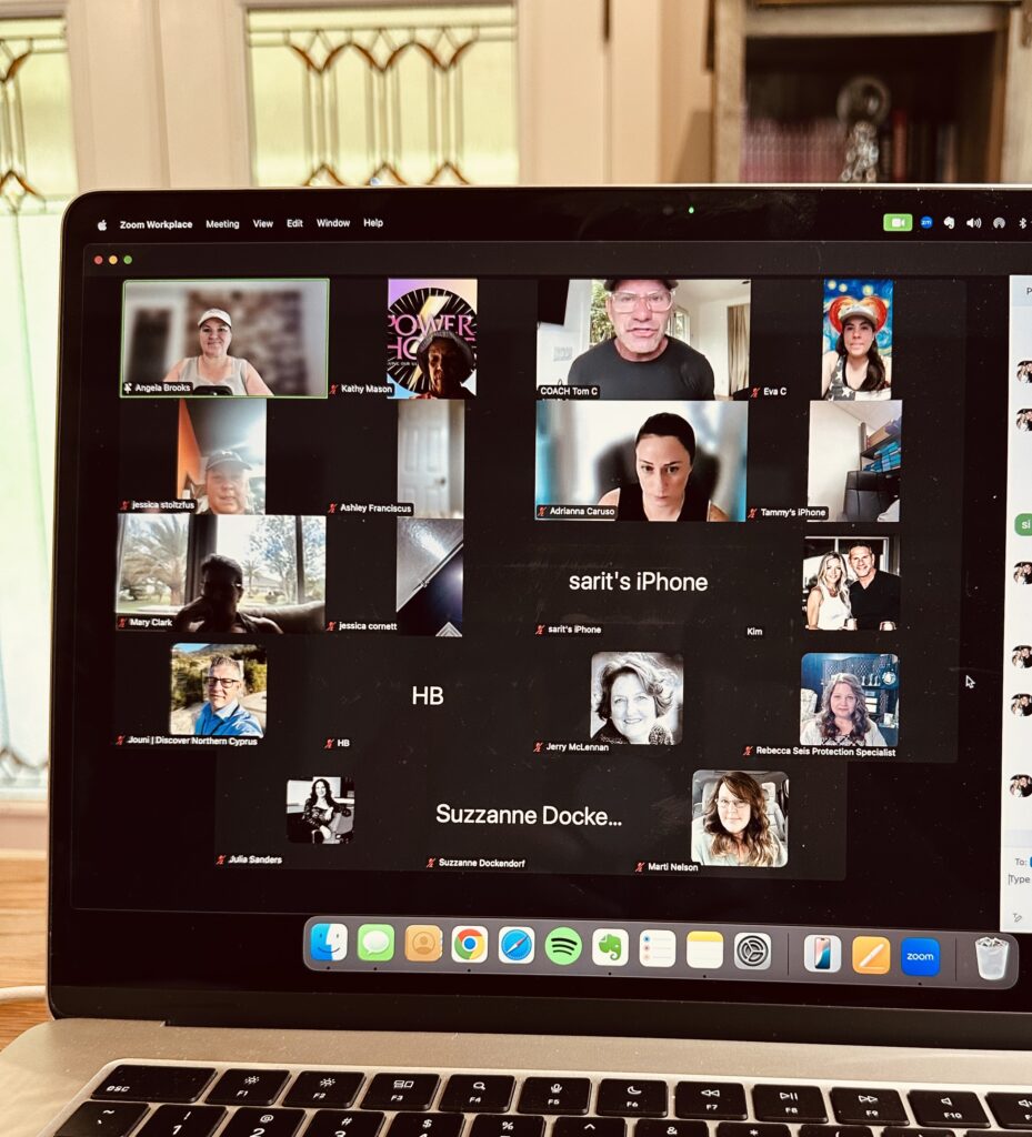Screenshot of a Zoom call with multiple participants during a Power Hour coaching session for entrepreneurs.