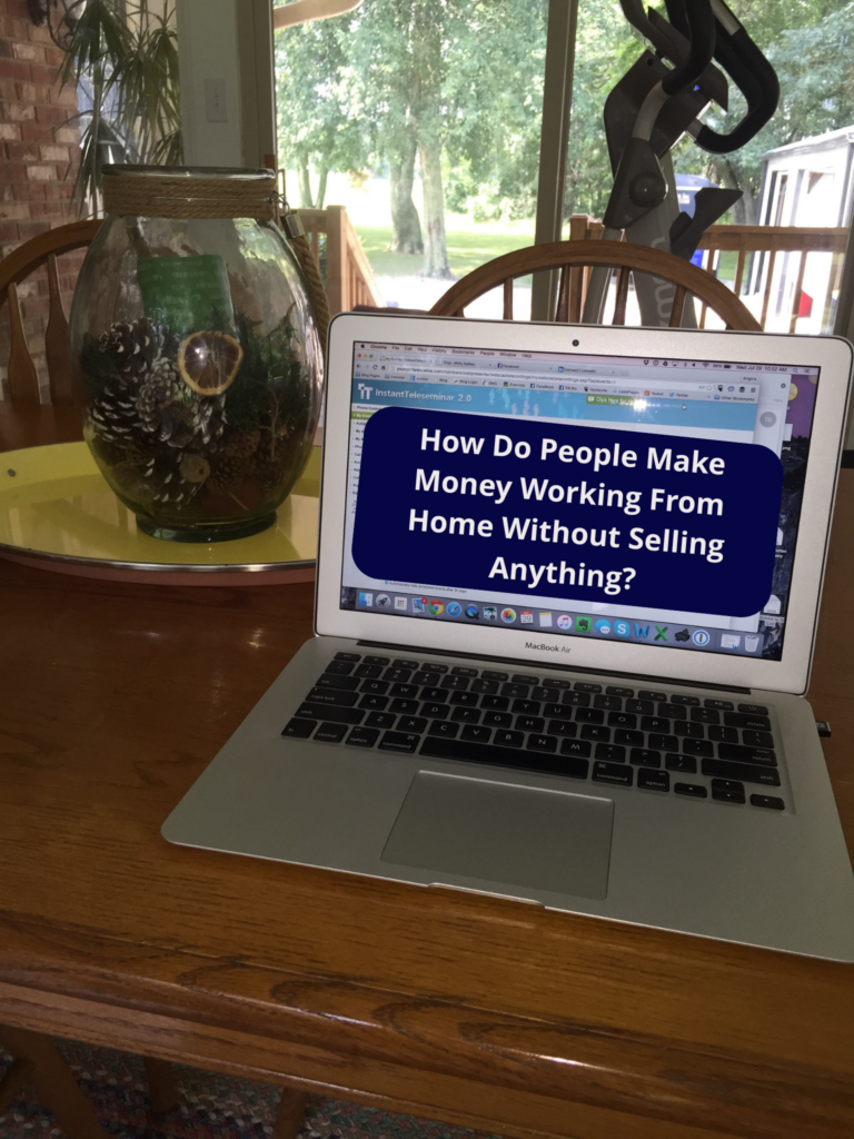 woman working from home on laptop making money without selling anything